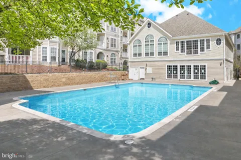 a view of a house with a swimming pool