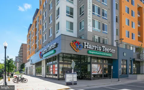 a view of a building with a street