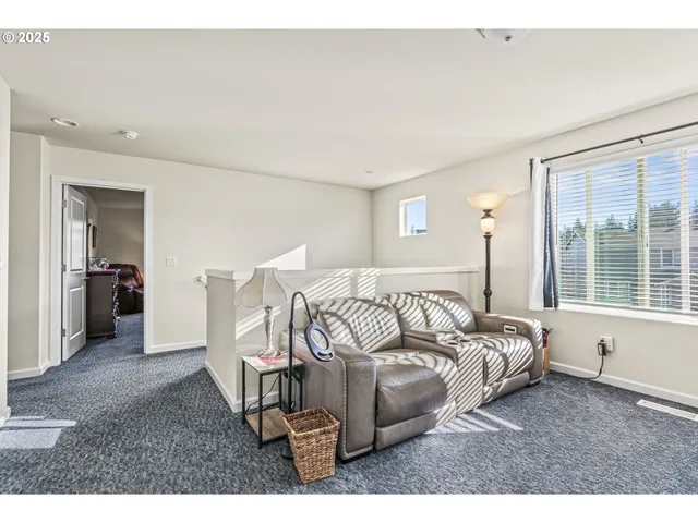 a bedroom with bed and a window