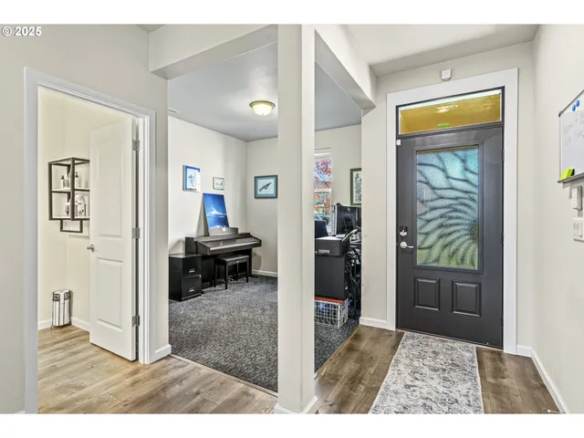 a view of a hallway and interior of house