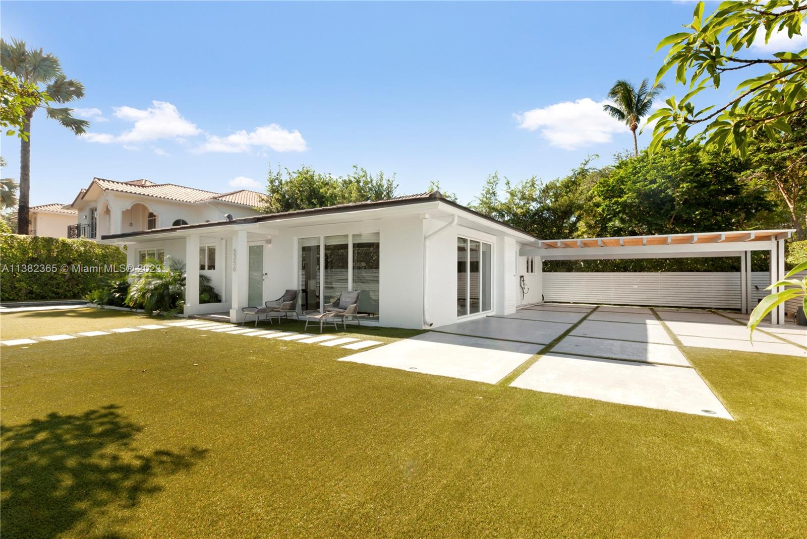 5356 Sunset Drive Miami, FL 33143 - Photo 27 of 29 a house view with a swimming pool