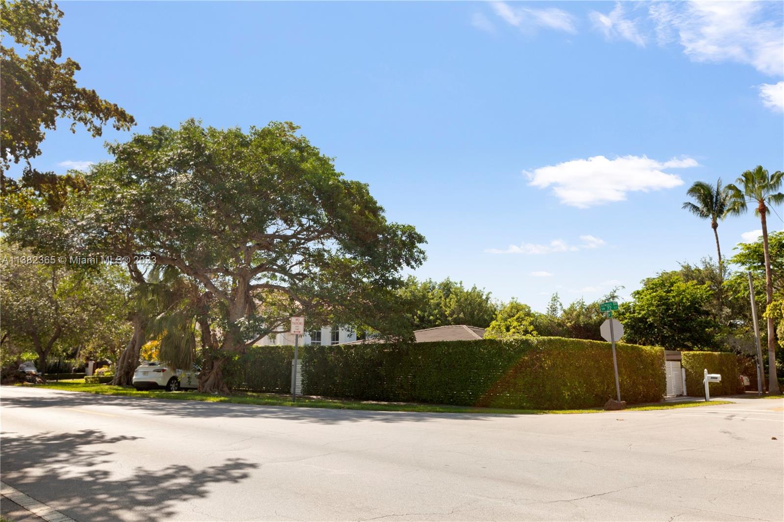 5356 Sunset Drive Miami, FL 33143 - Photo 28 of 29 a view of swimming pool and a yard