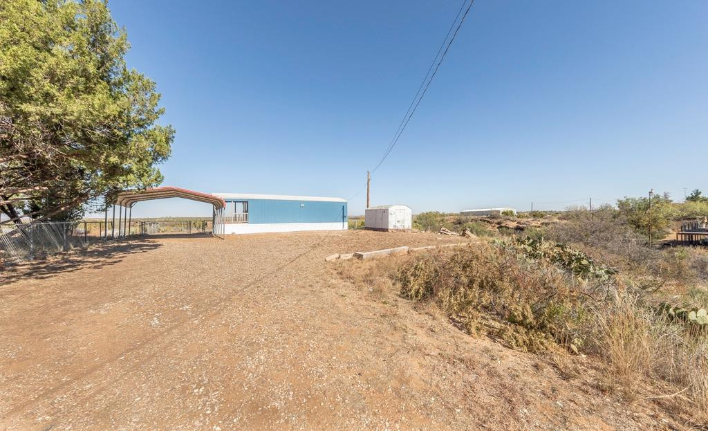 145 Lakesite Drive Spur, TX 79370 - Photo 14 of 20 a house with a yard