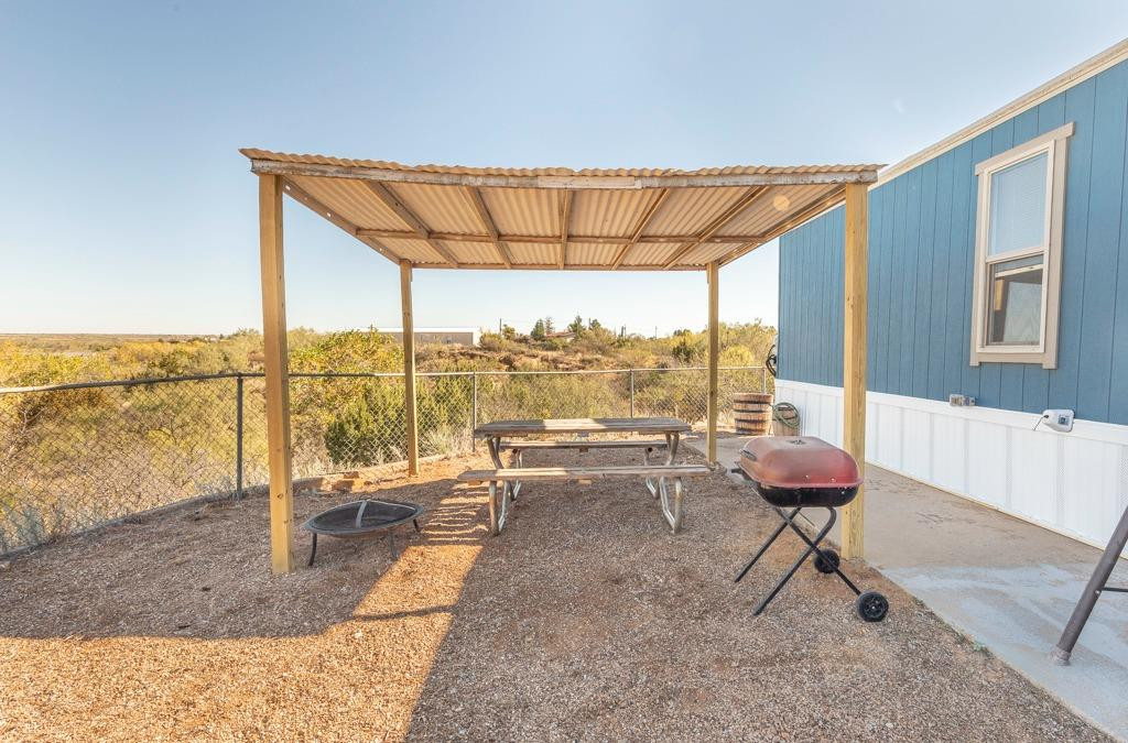 145 Lakesite Drive Spur, TX 79370 - Photo 19 of 20 a building outdoor space with patio lots of furniture