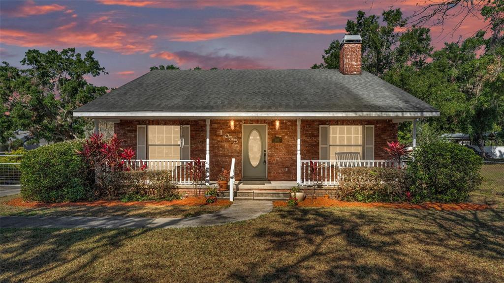 1055 Sunset Avenue Bartow, FL 33830 - Photo 1 of 1 a front view of a house with a yard