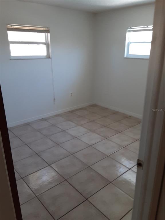 6429 Langston Avenue New Port Richey, FL 34653 - Photo 11 of 14 a view of a window in an empty room