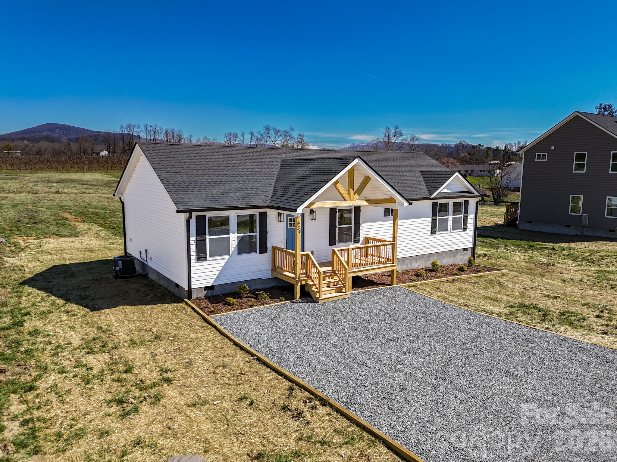 634 Beehive Road Hendersonville, NC 28792 - Photo 2 of 44 a front view of a house with a yard