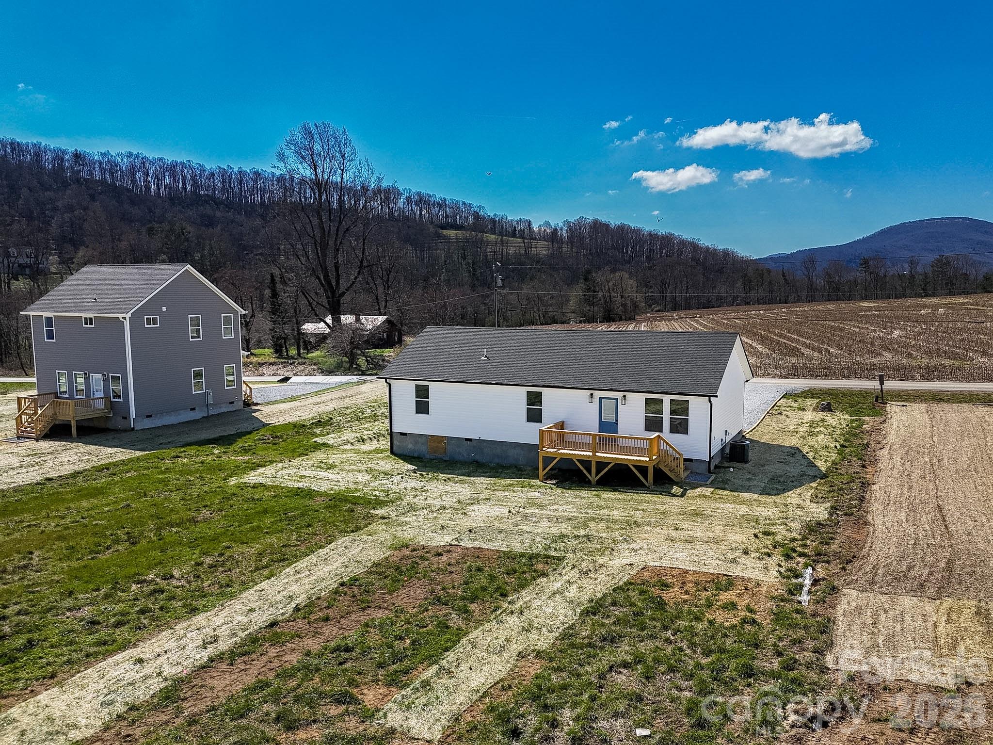 634 Beehive Road Hendersonville, NC 28792 - Photo 3 of 44 a view of a house with backyard and sitting area