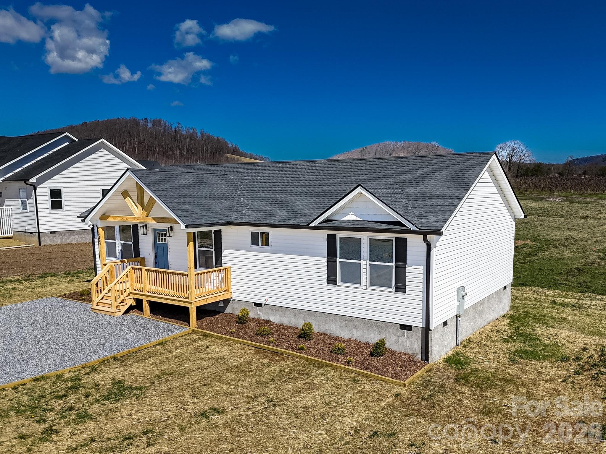 634 Beehive Road Hendersonville, NC 28792 - Photo 44 of 44 a front view of a house with a yard