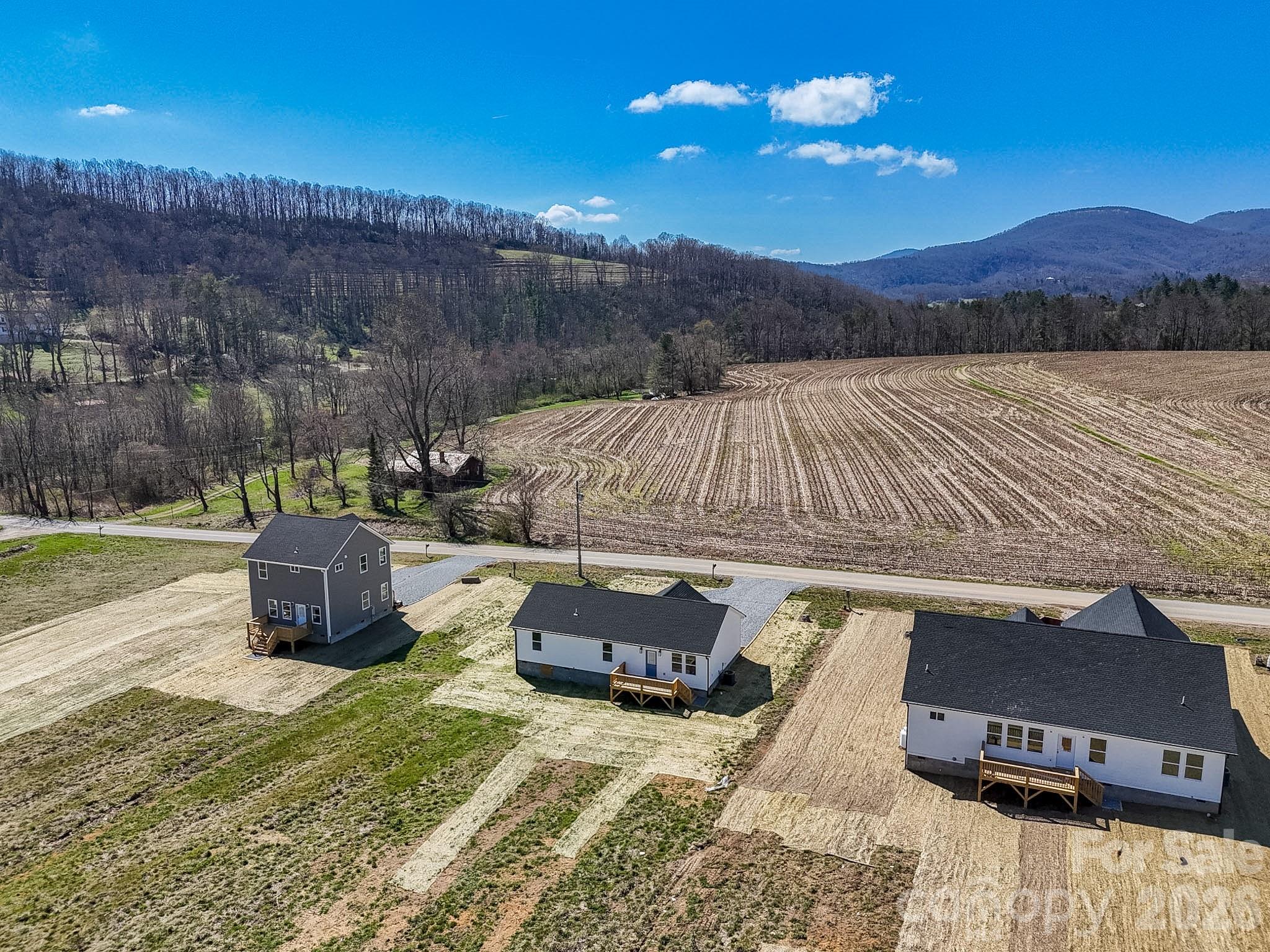 634 Beehive Road Hendersonville, NC 28792 - Photo 5 of 44 a view of a terrace with a yard