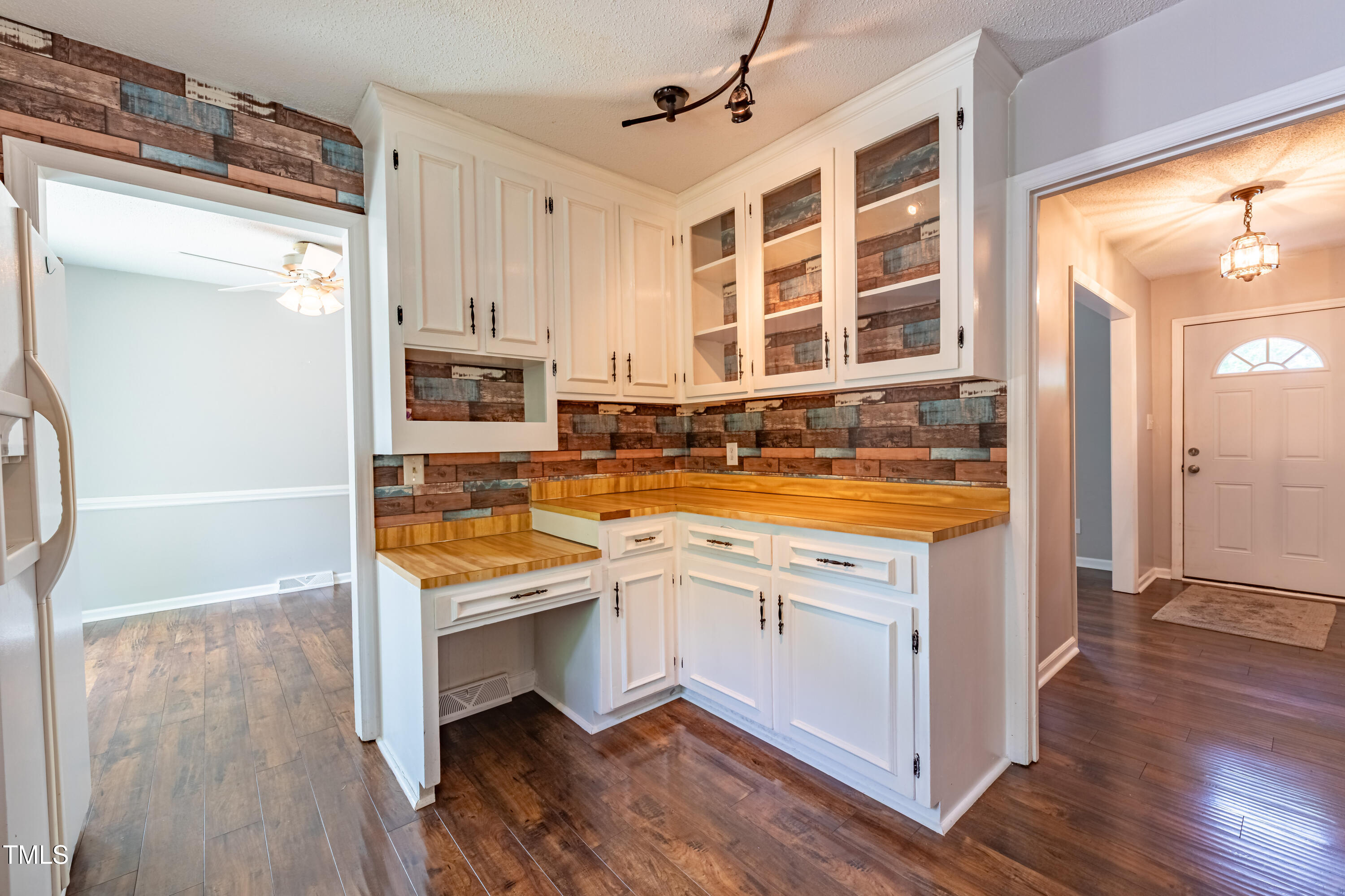 1500 Prisma Court Raleigh, NC 27612 - Photo 4 of 26 a view of a kitchen with stainless steel appliances granite countertop a refrigerator and a sink
