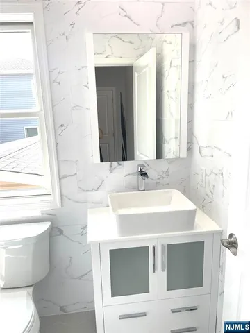 a bathroom with a sink and a toilet