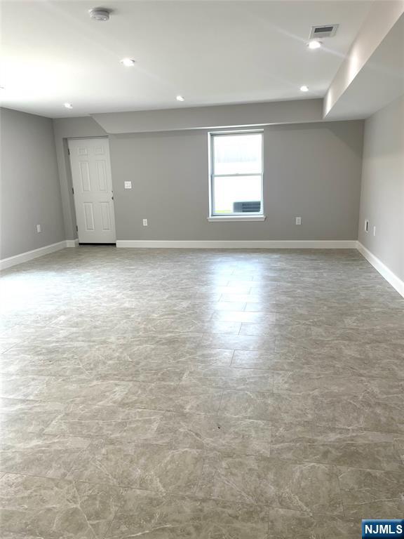 761 B 4th Street Secaucus, NJ 07094 - Photo 2 of 34 an empty room with windows