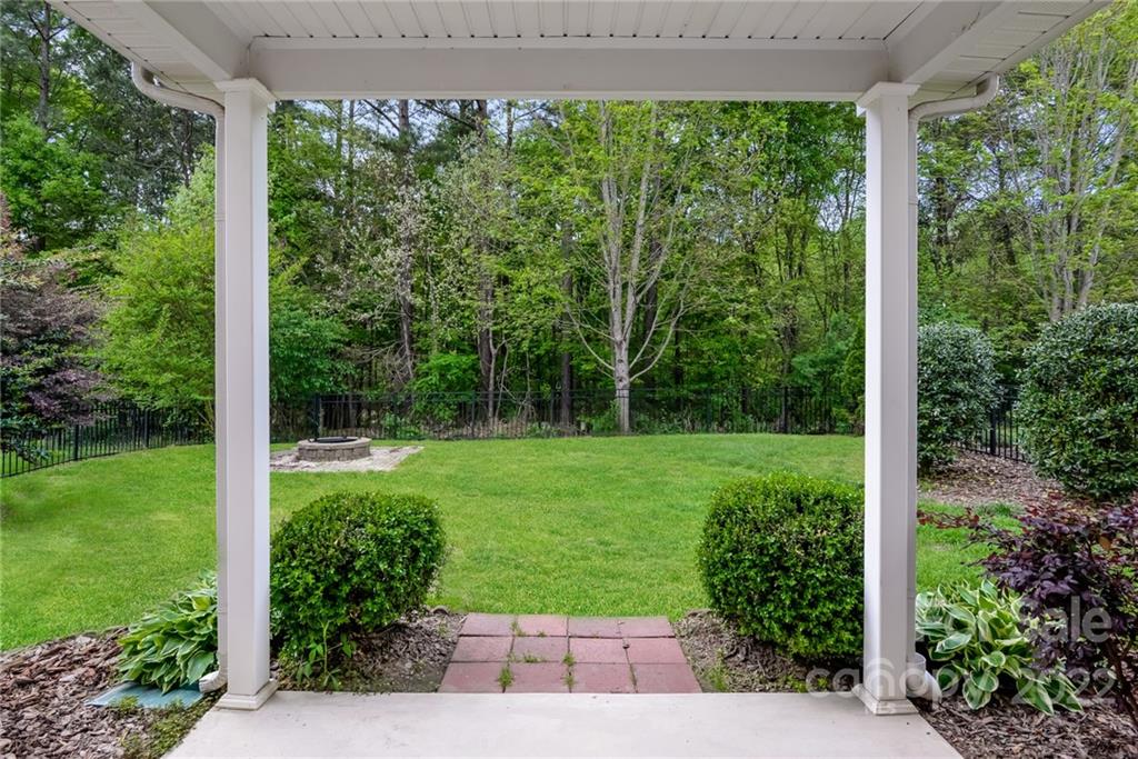 9337 Seamill Road Charlotte, NC 28278 - Photo 15 of 15 a view of a backyard with a garden