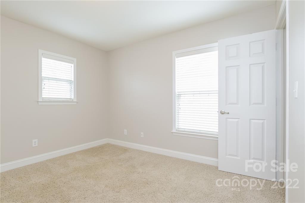 9337 Seamill Road Charlotte, NC 28278 - Photo 10 of 15 an empty room with windows