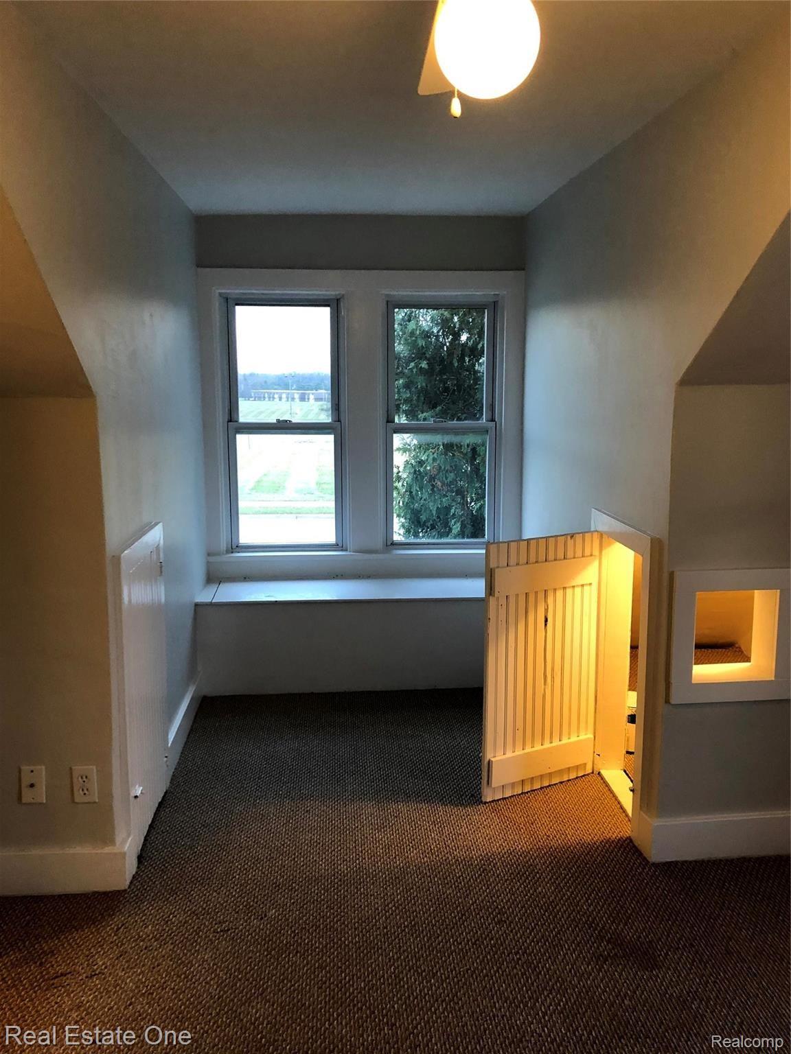 235 Millville Road Lapeer, MI 48446 - Photo 34 of 48 Bedroom #2 window seat with vinyl, tilt-in windows
