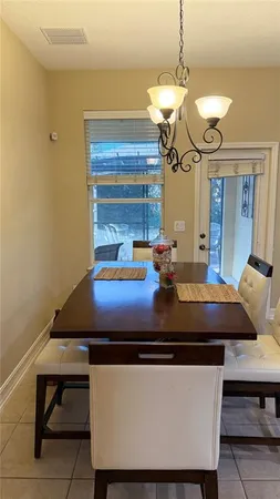 a room with table and chairs