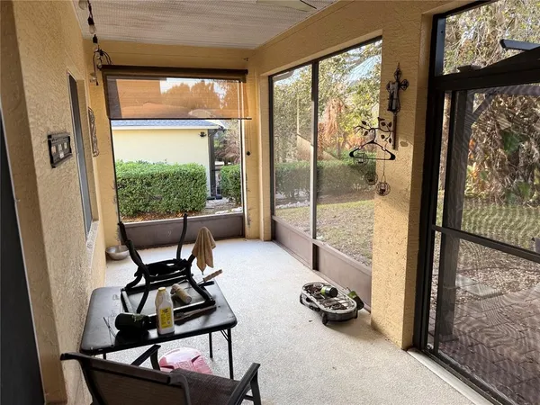 a room with furniture and a large window