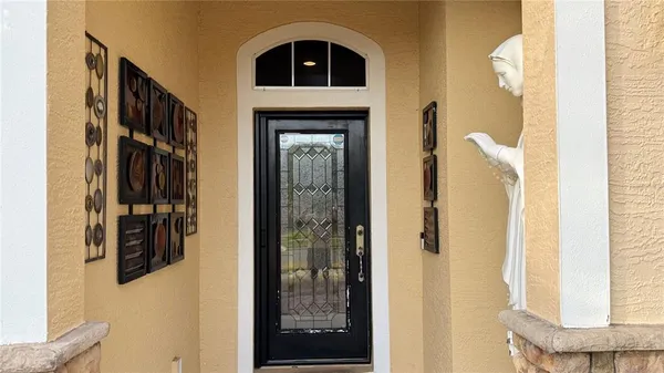 a view of an entryway with a door