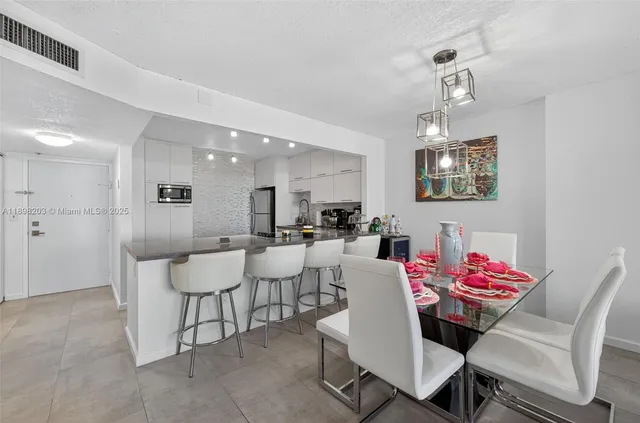 a view of a dining room with furniture