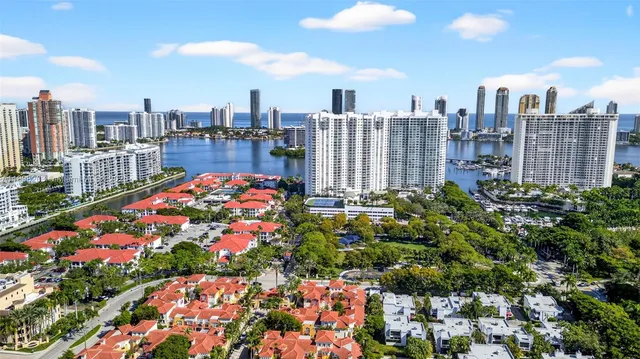 a view of a city with tall buildings