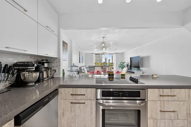 a kitchen with a stove and a sink