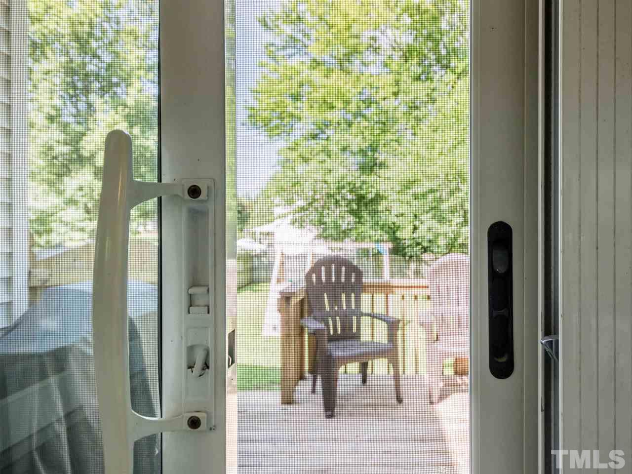 5402 Dorcas Street Raleigh, NC 27606 - Photo 15 of 18 a view of balcony with furniture