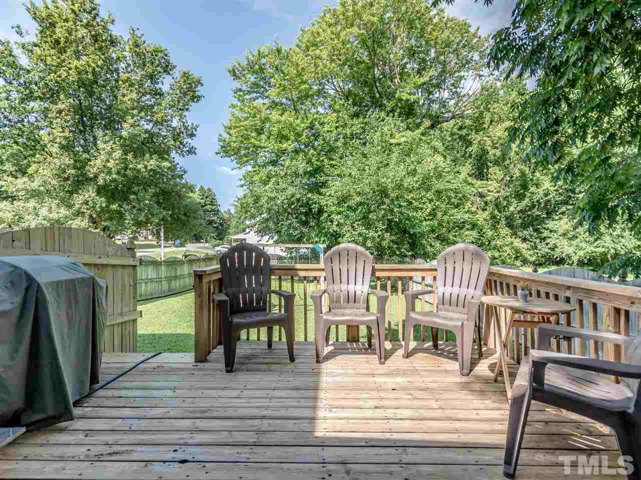 5402 Dorcas Street Raleigh, NC 27606 - Photo 16 of 18 a view of balcony deck and furniture
