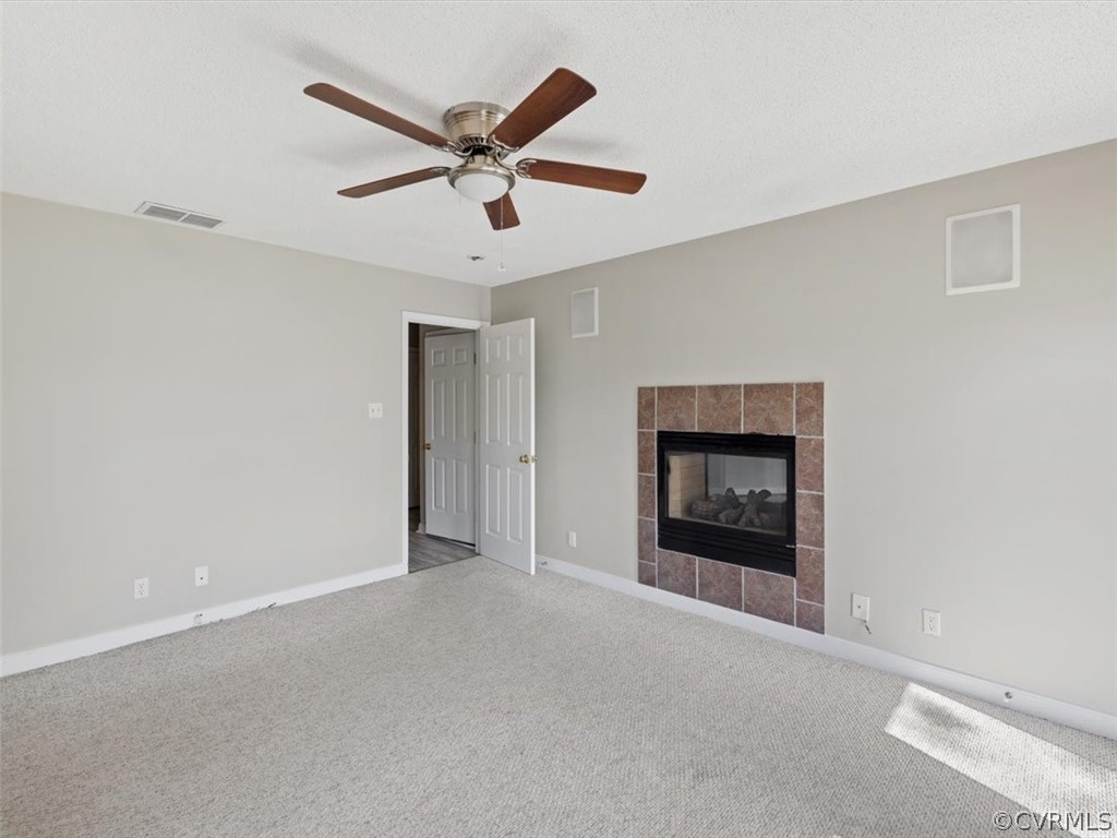 2249 Lakeview Drive Powhatan, VA 23139 - Photo 15 of 38 a view of an empty room with a fireplace
