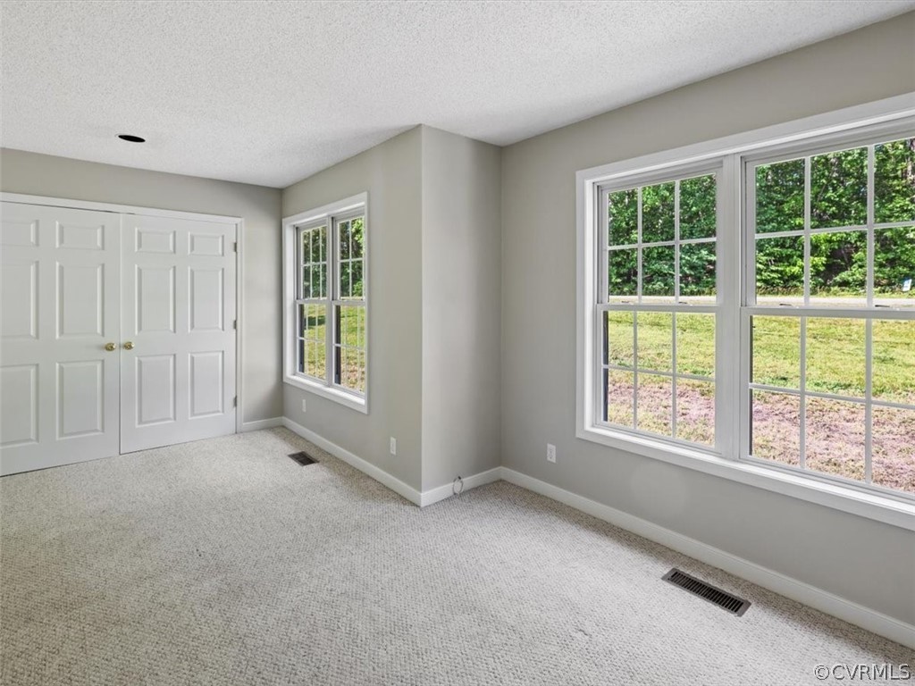 2249 Lakeview Drive Powhatan, VA 23139 - Photo 19 of 38 a view of an empty room with a window