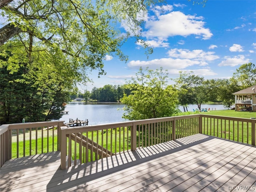 2249 Lakeview Drive Powhatan, VA 23139 - Photo 2 of 38 a view of a balcony with wooden fence