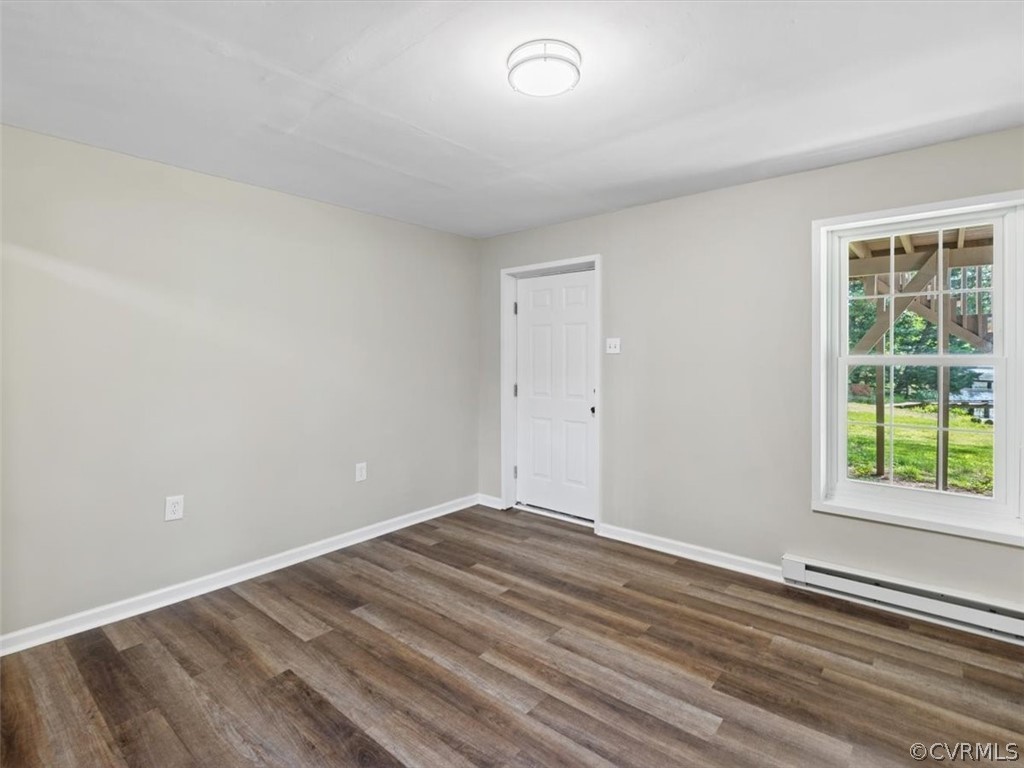 2249 Lakeview Drive Powhatan, VA 23139 - Photo 21 of 38 wooden floor in an empty room with a window