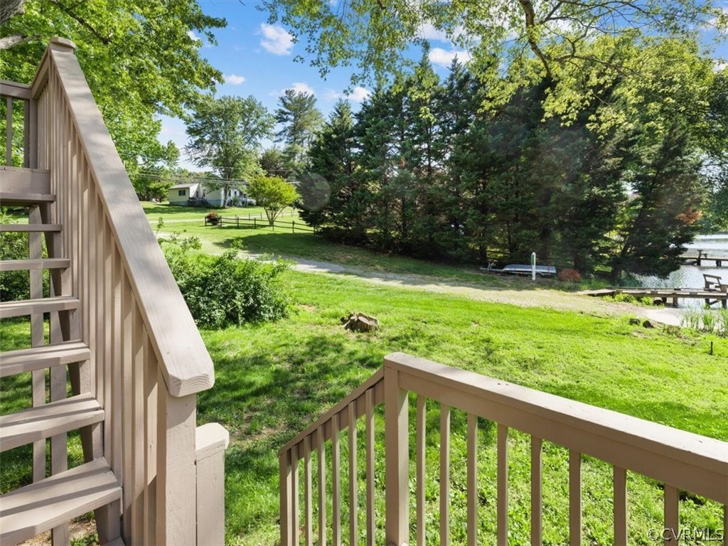 2249 Lakeview Drive Powhatan, VA 23139 - Photo 26 of 38 a balcony with trees in front of it