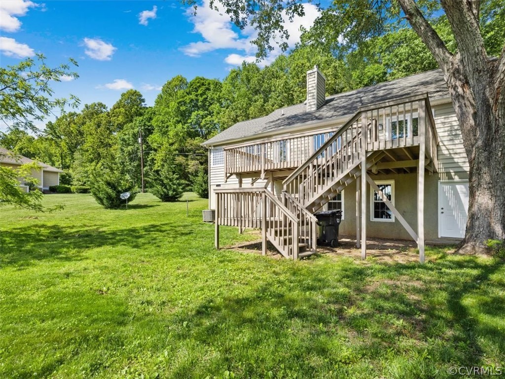 2249 Lakeview Drive Powhatan, VA 23139 - Photo 29 of 38 a view of a house with a yard