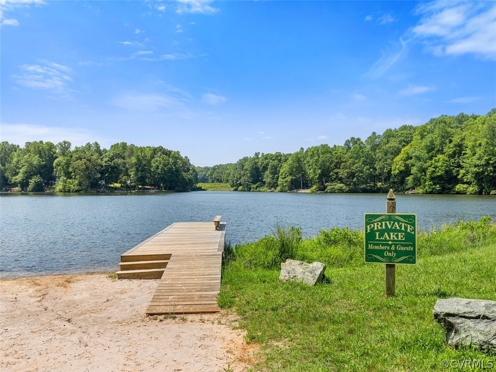 2249 Lakeview Drive Powhatan, VA 23139 - Photo 34 of 38 a lake view with a bench and trees