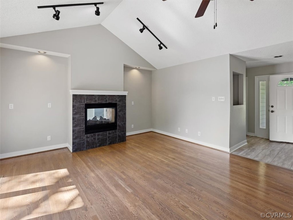 2249 Lakeview Drive Powhatan, VA 23139 - Photo 4 of 38 wooden floor in an empty room with a fireplace