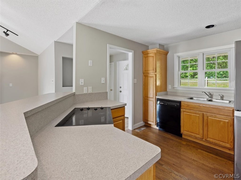 2249 Lakeview Drive Powhatan, VA 23139 - Photo 7 of 38 a kitchen with granite countertop a stove and a sink
