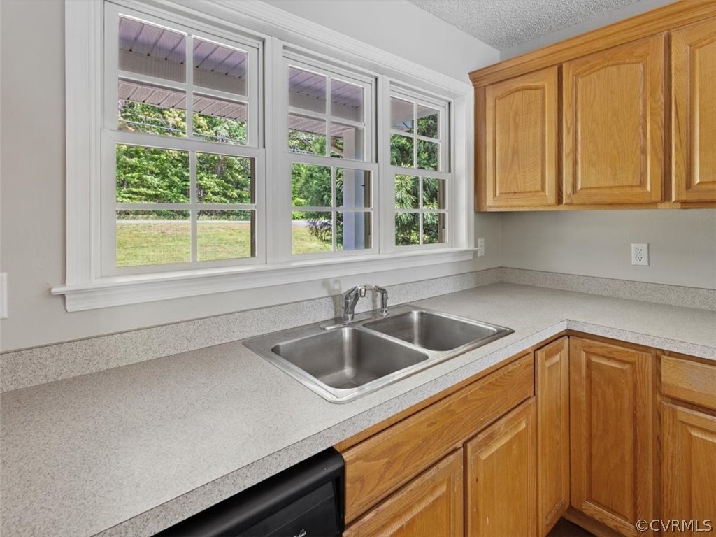 2249 Lakeview Drive Powhatan, VA 23139 - Photo 8 of 38 a kitchen with a sink and cabinets