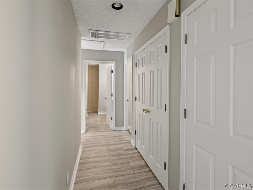 2249 Lakeview Drive Powhatan, VA 23139 - Photo 10 of 38 a view of a room with wooden floor