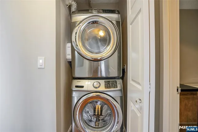 a view of washer and dryer in a utility room