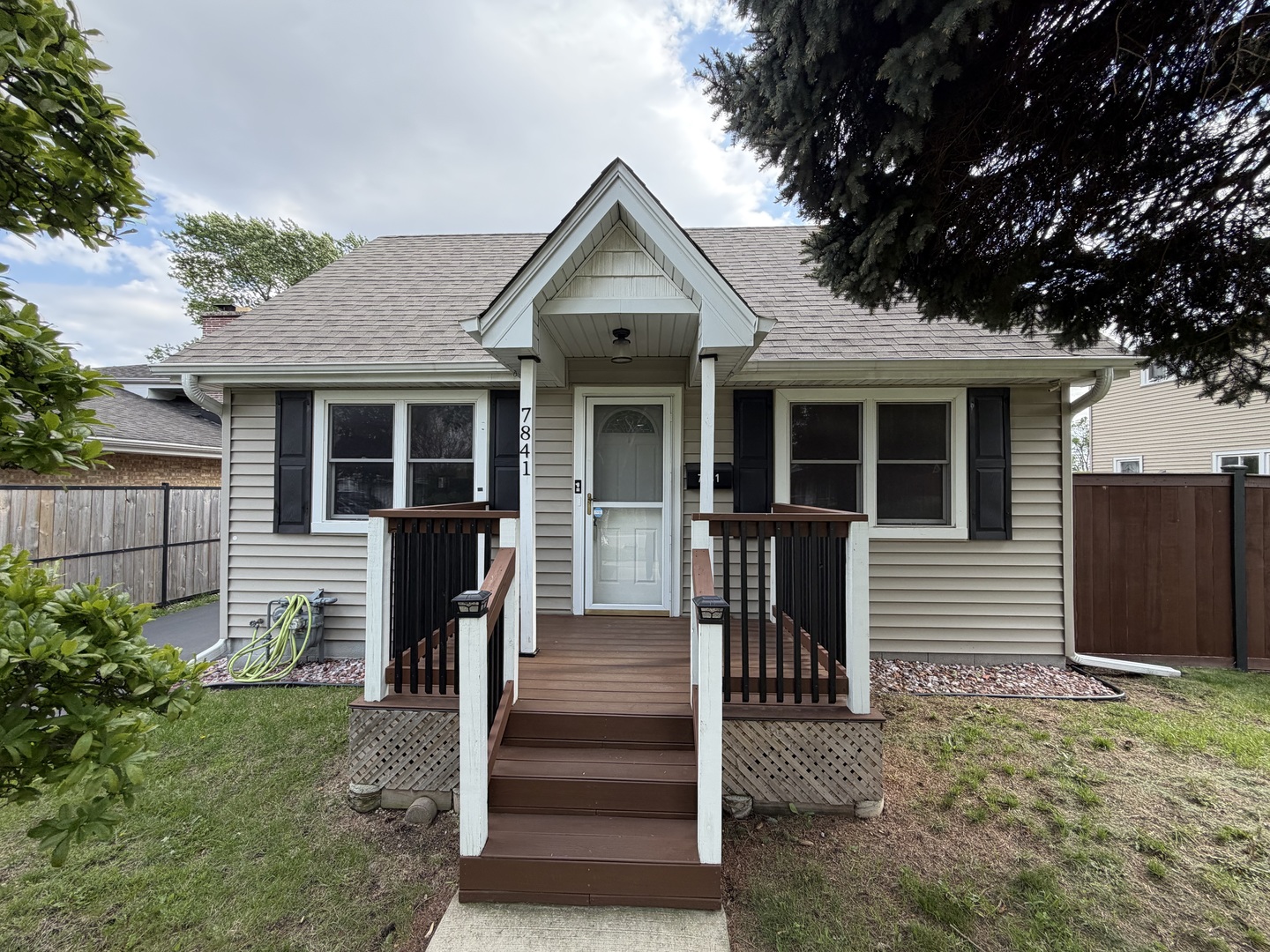 a front view of a house with a porch