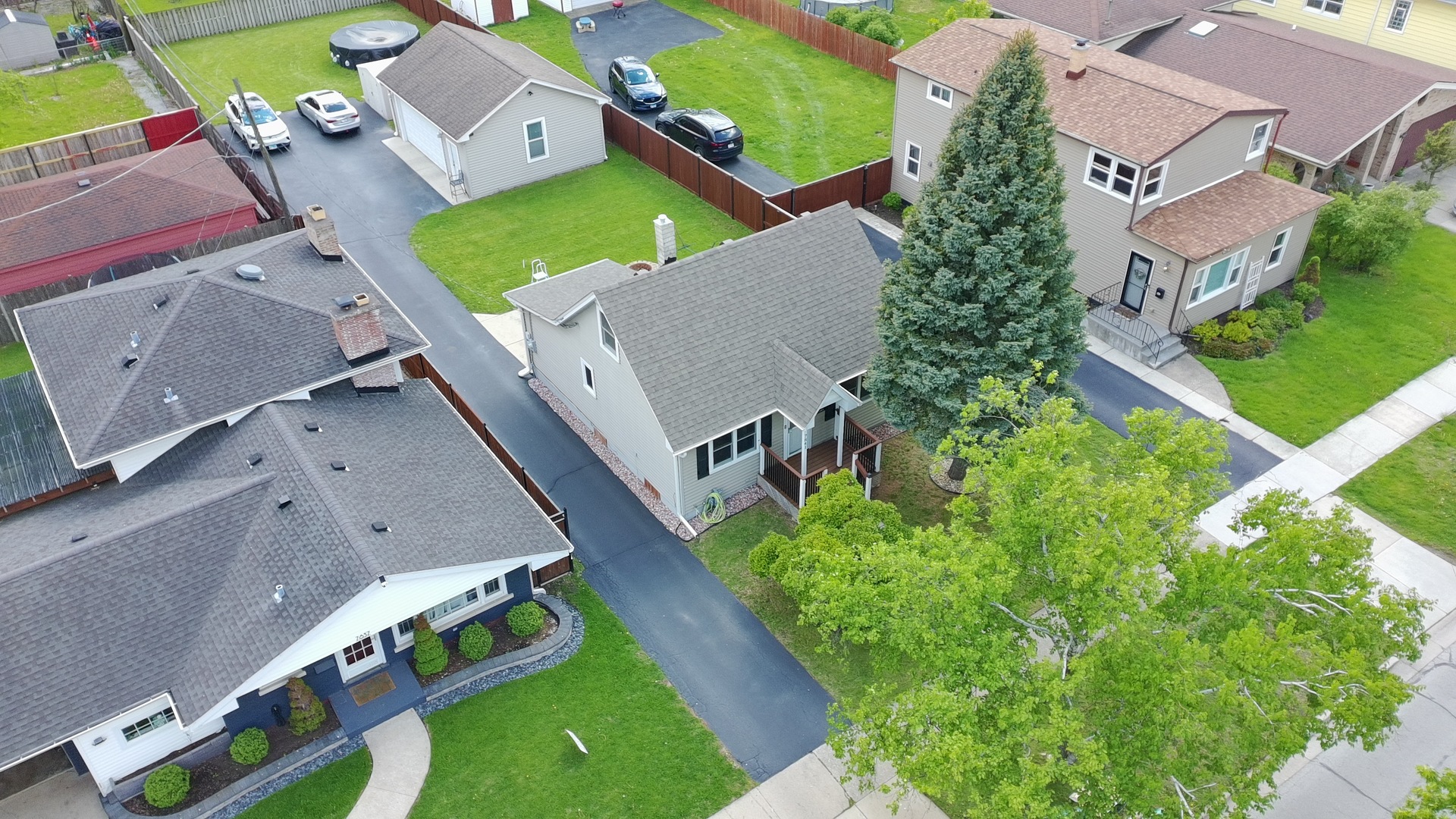 7841 45th Place Lyons, IL 60534 - Photo 2 of 23 an aerial view of a house with a garden