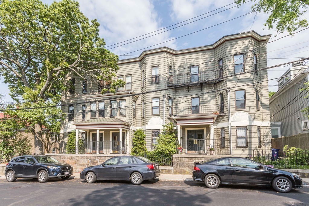 40 Rockview Street, Unit 4 Boston, MA 02130 - Photo 8 of 8 a car parked in front of a building