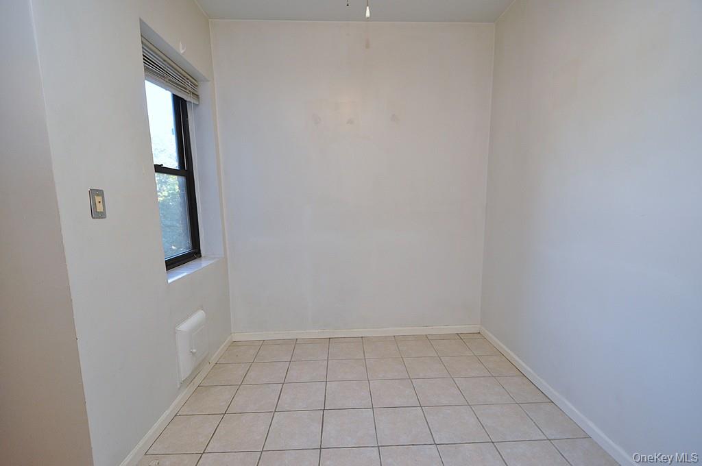 120 Stonelea Place, Unit 3M New Rochelle, NY 10801 - Photo 14 of 39 a view of an empty room
