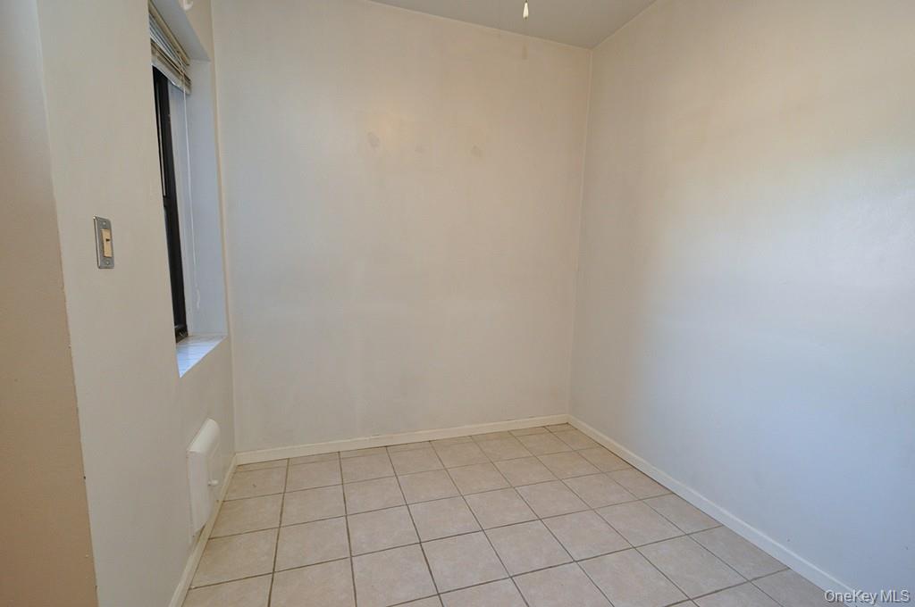 120 Stonelea Place, Unit 3M New Rochelle, NY 10801 - Photo 15 of 39 a view of an empty room