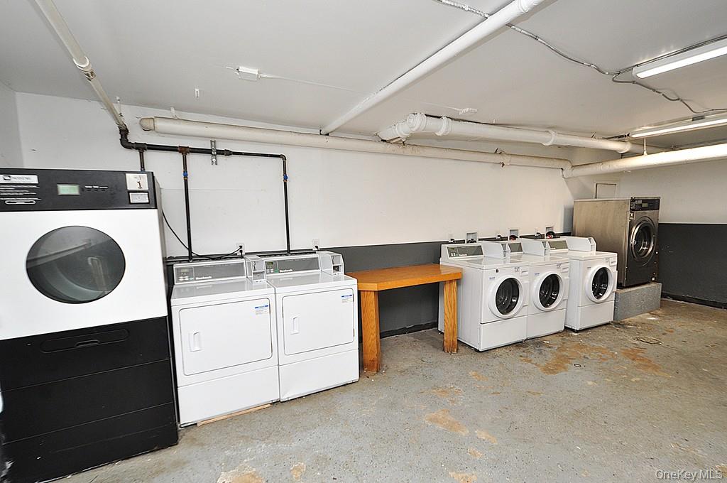 120 Stonelea Place, Unit 3M New Rochelle, NY 10801 - Photo 26 of 39 a utility room with dryer and washer