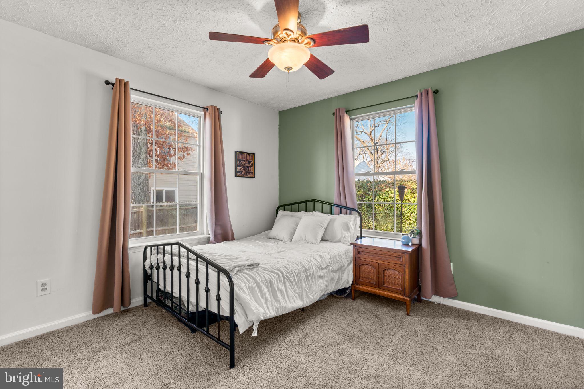 802 203rd Street Pasadena, MD 21122 - Photo 18 of 37 a bedroom with a bed and a window