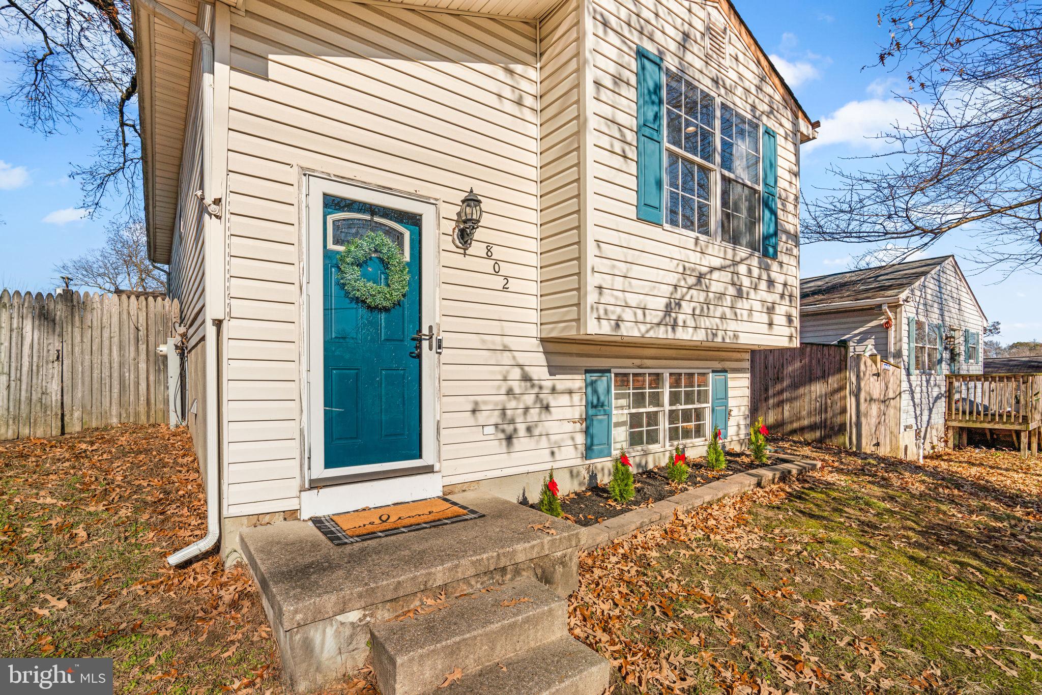 802 203rd Street Pasadena, MD 21122 - Photo 2 of 37 a front view of a house with a outdoor space