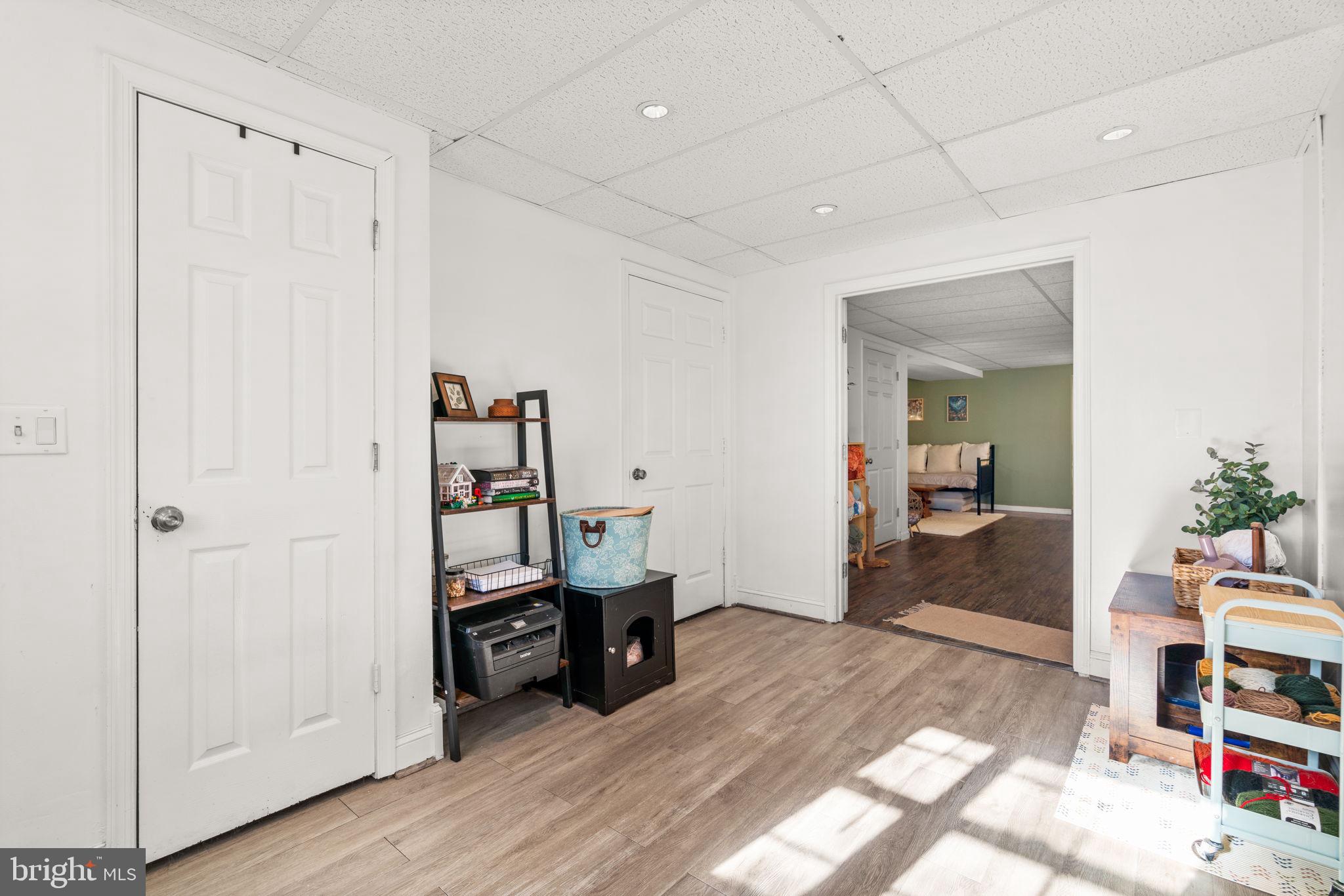 802 203rd Street Pasadena, MD 21122 - Photo 31 of 37 a view of a bedroom with workspace and bedroom