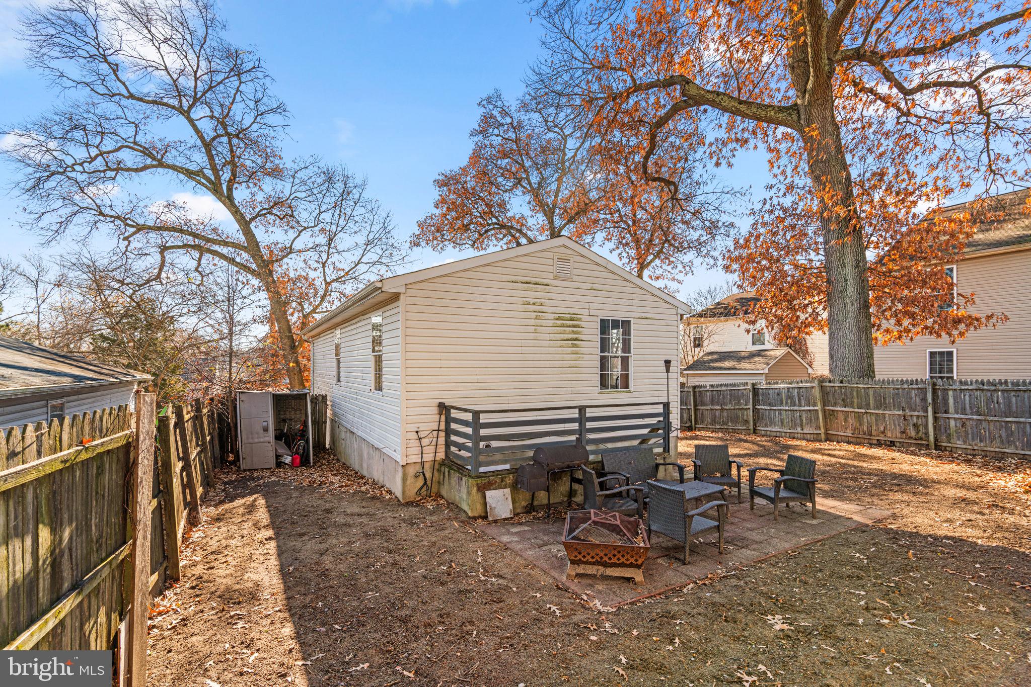802 203rd Street Pasadena, MD 21122 - Photo 35 of 37 a view of a outdoor space with a patio and backyard